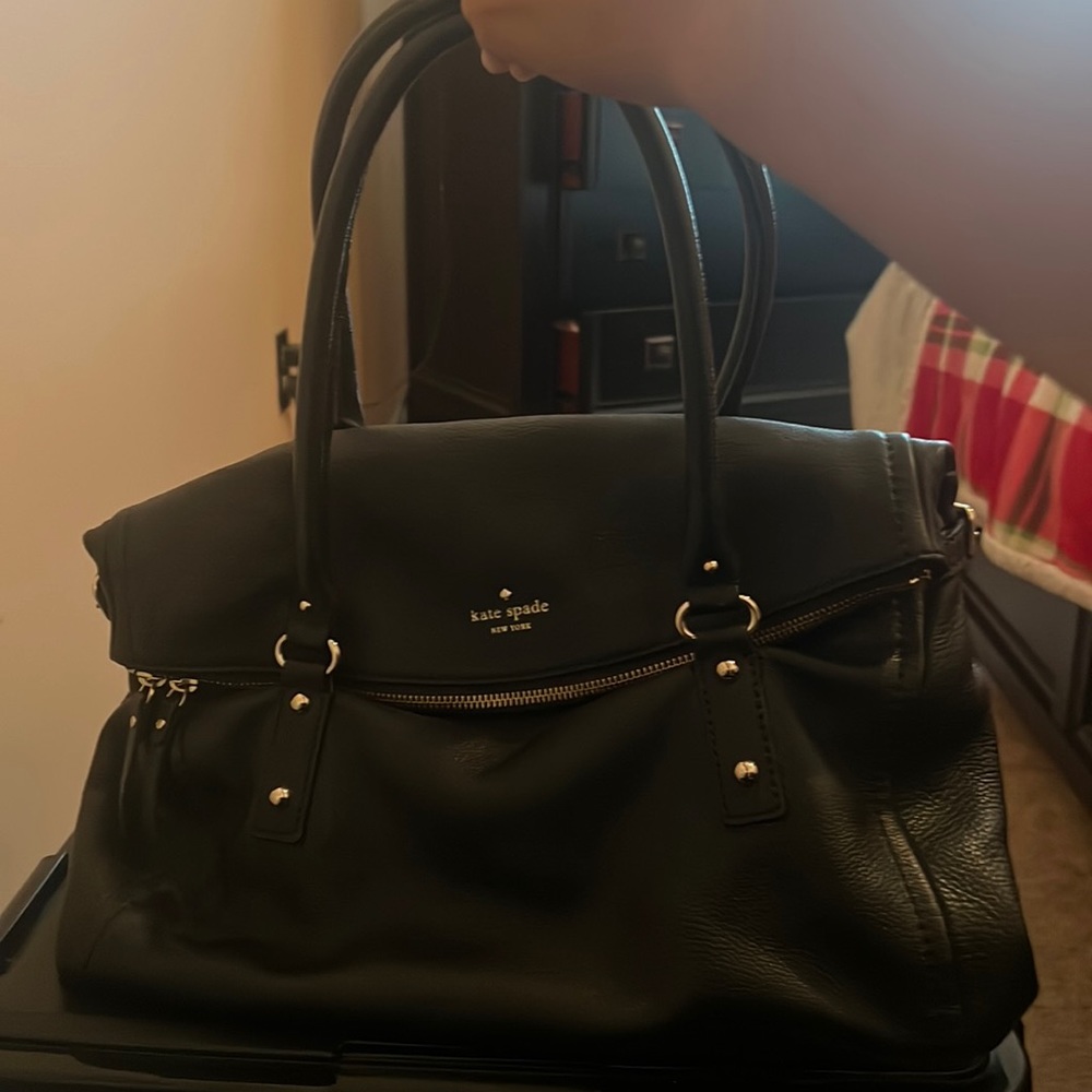 Brand new Kate Spade cobblestone leather black satchel with two jumbo pockets!